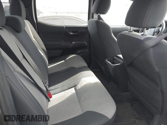 2022 Toyota Tacoma SR with VIN 3TMCZ5AN4NM476170, listed as a IAAI auction lot 41482149 with 57,126 mi miles and . Bid and sale history available at DreamBid. Image 8.