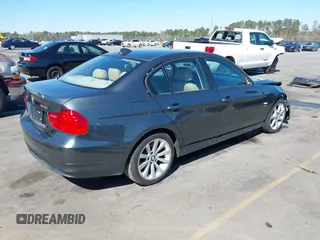 2011 BMW 3 Series 328i xDrive with VIN WBAPK5G57BNN28032, listed as a IAAI auction lot 41835525 with 207,713 mi miles. Bid and sale history available at carsss.com. Image 4.