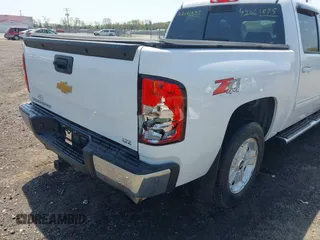 2013 Chevrolet Silverado 1500 LTZ with VIN 3GCPKTE24DG123063, listed as a IAAI auction lot 42061675 with 221,813 mi miles and . Bid and sale history available at DreamBid. Image 17.