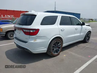 2018 Dodge Durango SRT with VIN 1C4SDJGJ2JC434843, listed as a IAAI auction lot 42434327 with 144,483 mi miles and . Bid and sale history available at DreamBid. Image 4.