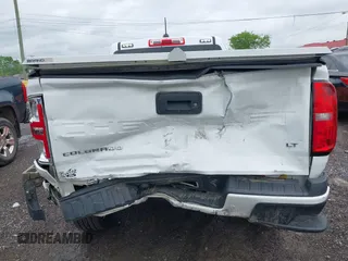 2021 Chevrolet Colorado 4WD LT z VIN 1GCHTCEA5M1244692, wystawiony jako IAAI lot #42096287 z przebiegiem 88 762 mil mil oraz . Historia ofert i sprzedaży dostępna na DreamBid. Obrazek 6.