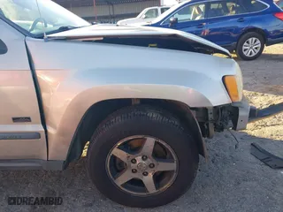2007 Jeep Grand Cherokee Laredo with VIN 1J8GS48K07C630303, listed as a IAAI auction lot 40993022 with 254,294 mi miles. Bid and sale history available at carsss.com. Image 16.
