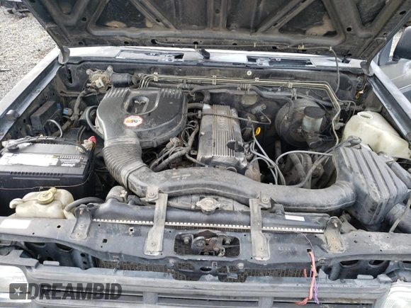 1991 Nissan Frontier with VIN 1N6SD11S9MC419923, listed as a Copart auction lot 85189314 with 245,003 mi miles and Salvage title. Bid and sale history available at DreamBid. Image 11.