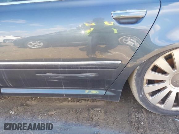 2006 Audi A8 4.2L with VIN WAUML44E06N019260, listed as a IAAI auction lot 40909905 with Not provided miles and . Bid and sale history available at DreamBid. Image 13.