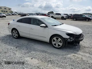 2014 Volkswagen CC R-Line with VIN WVWBP7AN4EE525757, listed as a Copart auction lot 55293795 with 124,890 mi miles and Salvage title. Bid and sale history available at DreamBid. Image 4.