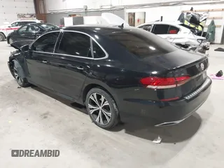 2021 Volkswagen Passat SE z VIN 1VWSA7A39MC001401, wystawiony jako IAAI lot #42019308 z przebiegiem 82 203 mil mil oraz . Historia ofert i sprzedaży dostępna na DreamBid. Obrazek 3.