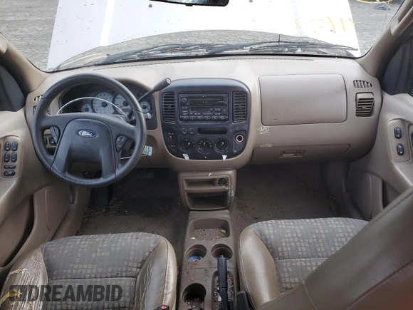 2001 Ford Escape XLS with VIN 1FMYU02111KA37010, listed as a Copart auction lot 52328415 with 312,425 mi miles and Salvage title. Bid and sale history available at DreamBid. Image 8.