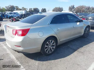 2015 Chevrolet Malibu LTZ with VIN 1G11F5SL0FF336477, listed as a IAAI auction lot 41844225 with 121,384 mi miles. Bid and sale history available at carsss.com. Image 4.