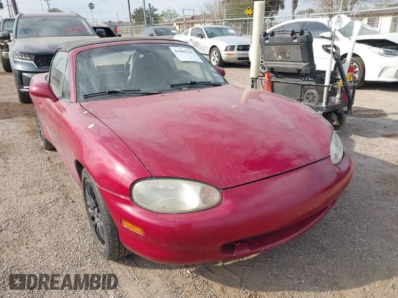 1999 Mazda MX-5 Miata z VIN JM1NB3531X0129508, wystawiony jako IAAI lot #41601347 z przebiegiem 156 702 mil mil oraz . Historia ofert i sprzedaży dostępna na DreamBid. Obrazek 1.