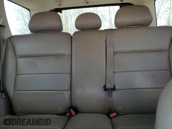 2005 Ford Escape XLT with VIN 1FMYU93195KA54937, listed as a Copart auction lot 52060135 with 95,649 mi miles and Clean Title. Bid and sale history available at carsss.com. Image 10.