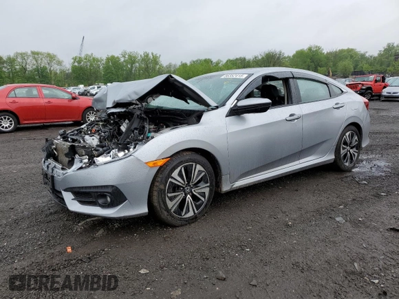2017 Honda Civic EX-L z VIN 19XFC1F74HE209787, wystawiony jako Copart lot #56352415 z przebiegiem 130 264 mil mil oraz Szkoda całkowita • Salvage title. Historia ofert i sprzedaży dostępna na DreamBid. Obrazek 1.