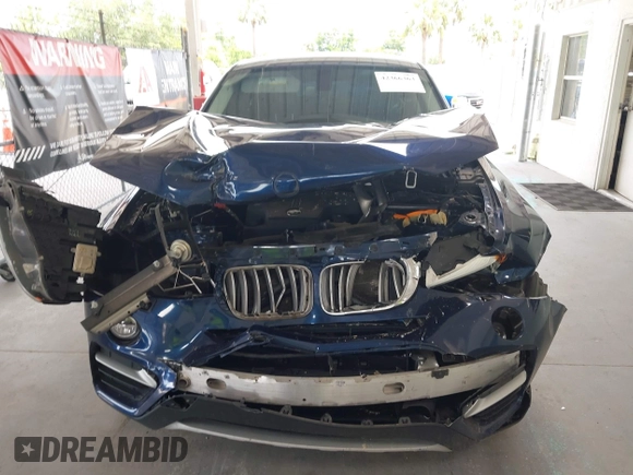 2015 BMW X4 xDrive28i with VIN 5UXXW3C51F0M87268, listed as a IAAI auction lot 42366363 with 143,285 mi miles and . Bid and sale history available at DreamBid. Image 6.