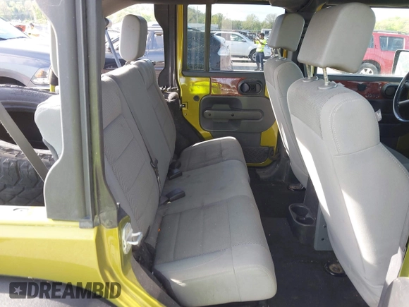 2007 Jeep Wrangler Unlimited Sahara with VIN 1J4GA59177L182593, listed as a IAAI auction lot 42104934 with 158,990 mi miles and . Bid and sale history available at DreamBid. Image 8.