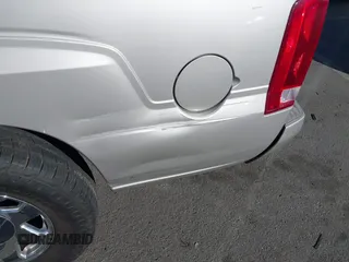 2005 Cadillac Escalade ESV z VIN 3GYFK66N75G215284, wystawiony jako IAAI lot #41320914 z przebiegiem Nie podano mil oraz . Historia ofert i sprzedaży dostępna na DreamBid. Obrazek 6.