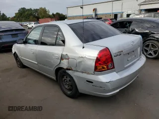 2005 Hyundai Accent GLS with VIN KMHCG45C45U631414, listed as a Copart auction lot 73963814 with 106,617 mi miles and Salvage Title. Bid and sale history available at carsss.com. Image 2.