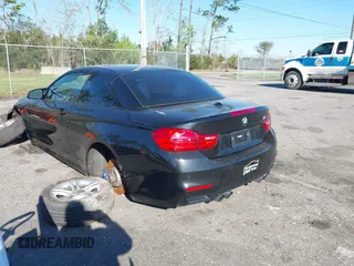 2015 BMW M4 with VIN WBS3U9C56FP967590, listed as a IAAI auction lot 41732730 with 48,927 mi miles and . Bid and sale history available at DreamBid. Image 3.