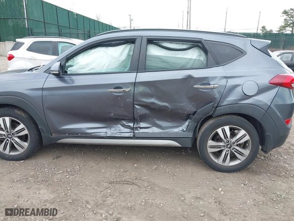 2017 Hyundai Tucson Value with VIN KM8J33A21HU359113, listed as a IAAI auction lot 41897638 with 80,010 mi miles. Bid and sale history available at carsss.com. Image 6.