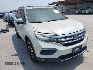 2017 Honda Pilot Touring z VIN 5FNYF6H93HB007898, wystawiony jako IAAI lot #42289193 z przebiegiem 70 498 mil mil oraz . Historia ofert i sprzedaży dostępna na DreamBid. Obrazek 1.