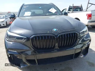 2021 BMW X5 xDrive40i with VIN 5UXCR6C01M9E66976, listed as a IAAI auction lot 42024110 with 67,877 mi miles and . Bid and sale history available at DreamBid. Image 13.