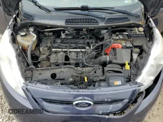 2013 Ford Fiesta S z VIN 3FADP4TJ6DM164936, wystawiony jako Copart lot #55470645 z przebiegiem 105 535 mil mil oraz Szkoda całkowita • Salvage title. Historia ofert i sprzedaży dostępna na DreamBid. Obrazek 11.