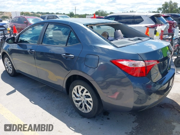 2018 Toyota Corolla L with VIN 5YFBURHE1JP832911, listed as a IAAI auction lot 42237901 with 92,158 mi miles and . Bid and sale history available at DreamBid. Image 3.