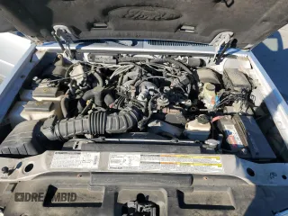 2001 Ford Explorer Sport z VIN 1FMYU70E51UB97037, wystawiony jako Copart lot #76293004 z przebiegiem 130 458 mil mil oraz Szkody całkowita. Historia ofert i sprzedaży dostępna na DreamBid. Obrazek 12.