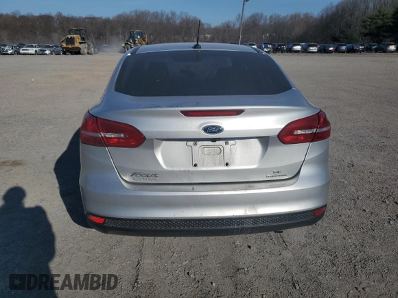 2016 Ford Focus SE with VIN 1FADP3F28GL395583, listed as a Copart auction lot 48523415 with 41,996 mi miles and Salvage Title. Bid and sale history available at DreamBid. Image 6.