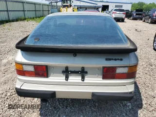 1984 Porsche 944 z VIN WP0AA0944EN453698, wystawiony jako Copart lot #59757475 z przebiegiem 17 718 mil mil oraz Szkoda całkowita • Salvage title. Historia ofert i sprzedaży dostępna na DreamBid. Obrazek 6.