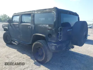 2003 Hummer H2 z VIN 5GRGN23UX3H140510, wystawiony jako IAAI lot #42325527 z przebiegiem 140 010 mil mil oraz . Historia ofert i sprzedaży dostępna na DreamBid. Obrazek 3.