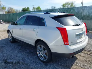 2011 Cadillac SRX Performance Collection with VIN 3GYFNEEYXBS559777, listed as a IAAI auction lot 41901651 with 177,662 mi miles. Bid and sale history available at carsss.com. Image 3.