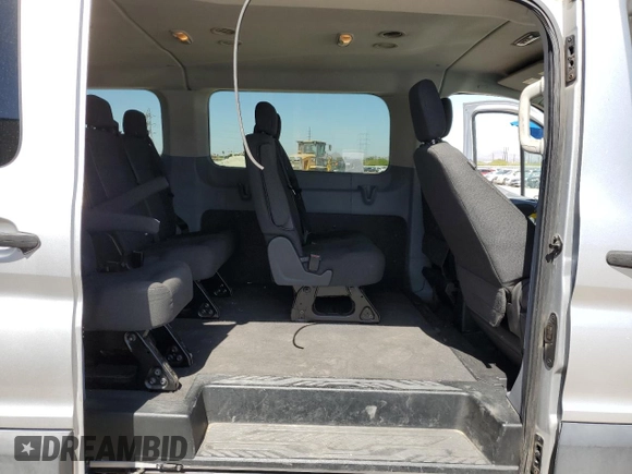 2015 Ford Transit XL with VIN 1FMZK1YMXFKB16362, listed as a Copart auction lot 57024515 with 112,665 mi miles and Salvage title. Bid and sale history available at DreamBid. Image 11.
