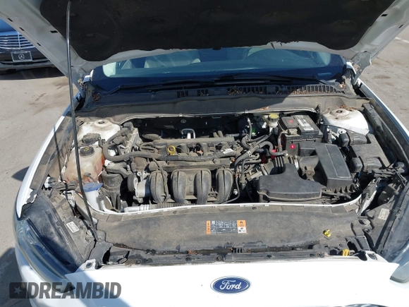 2016 Ford Fusion S z VIN 3FA6P0G79GR157809, wystawiony jako IAAI lot #41994860 z przebiegiem 161 049 mil mil oraz . Historia ofert i sprzedaży dostępna na DreamBid. Obrazek 10.