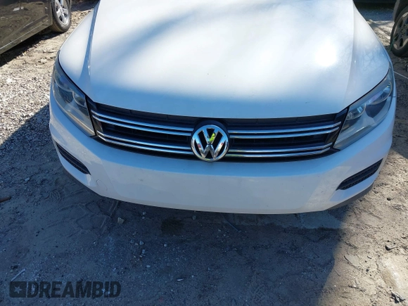2012 Volkswagen Tiguan SE with VIN WVGAV7AX9CW590965, listed as a IAAI auction lot 41852407 with 153,953 mi miles and . Bid and sale history available at DreamBid. Image 6.