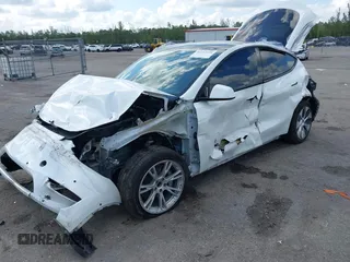 2021 Tesla Model Y Long Range z VIN 5YJYGDEE2MF200315, wystawiony jako IAAI lot #42233599 z przebiegiem 38 742 mil mil oraz . Historia ofert i sprzedaży dostępna na DreamBid. Obrazek 2.