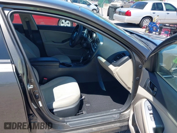 2014 Kia Optima LX with VIN 5XXGM4A71EG335165, listed as a IAAI auction lot 42052378 with 154,574 mi miles. Bid and sale history available at carsss.com. Image 5.