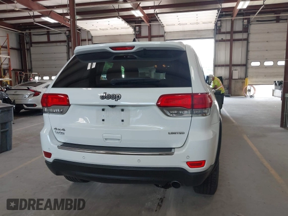 2016 Jeep Grand Cherokee Limited with VIN 1C4RJFBG2GC490483, listed as a IAAI auction lot 42596513 with 113,937 mi miles and . Bid and sale history available at DreamBid. Image 16.