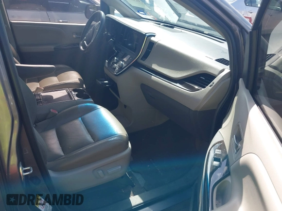 2015 Toyota Sienna XLE with VIN 5TDYK3DC6FS542504, listed as a IAAI auction lot 42569992 with 113,004 mi miles and . Bid and sale history available at DreamBid. Image 5.