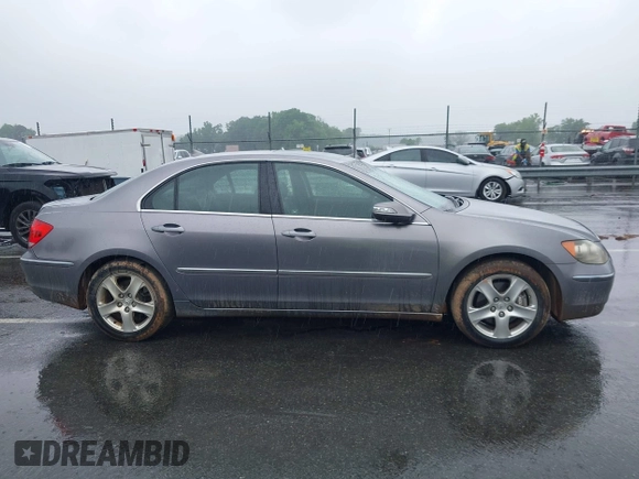 2006 Acura RL z VIN JH4KB16516C012532, wystawiony jako IAAI lot #42095836 z przebiegiem 177 194 mil mil oraz . Historia ofert i sprzedaży dostępna na DreamBid. Obrazek 14.