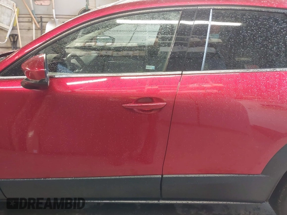 2023 Mazda CX-30 S Premium with VIN 3MVDMBDM5PM518612, listed as a IAAI auction lot 42219265 with 29,135 mi miles and . Bid and sale history available at DreamBid. Image 14.