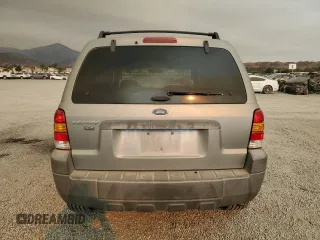2005 Ford Escape XLT with VIN 1FMYU93Z35KC52175, listed as a Copart auction lot 71214694 with 125,278 mi miles and Salvage Title. Bid and sale history available at carsss.com. Image 6.