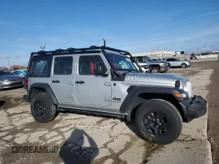 2023 Jeep Wrangler Sport S with VIN 1C4HJXDG0PW670641, listed as a Copart auction lot 41623195 with 27,266 mi miles and Salvage Title. Bid and sale history available at DreamBid. Image 4.