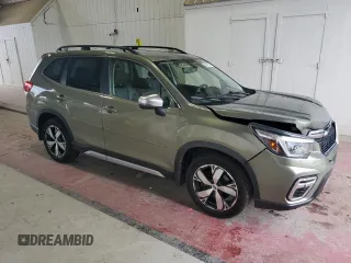 2021 Subaru Forester Touring with VIN JF2SKAXC1MH481717, listed as a Copart auction lot 64078355 with 62,104 mi miles and Salvage title. Bid and sale history available at DreamBid. Image 4.