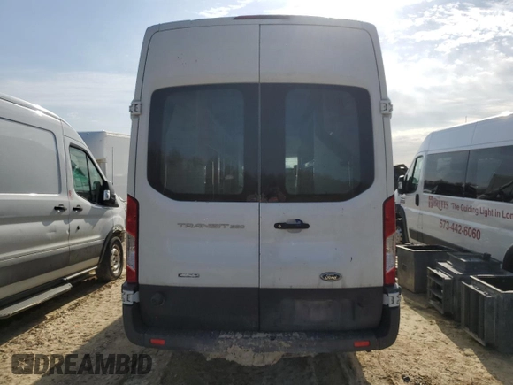 2017 Ford Transit with VIN 1FTYR3XG9HKB12597, listed as a Copart auction lot 52020935 with 281,009 mi miles and Salvage title. Bid and sale history available at DreamBid. Image 6.