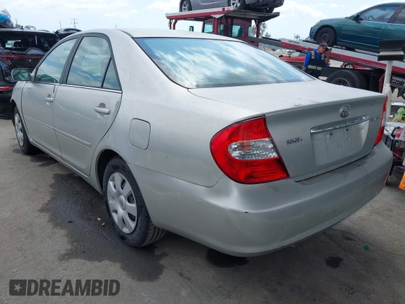 2004 Toyota Camry LE with VIN 4T1BE32K34U857725, listed as a IAAI auction lot 42131740 with 107,975 mi miles and . Bid and sale history available at DreamBid. Image 3.