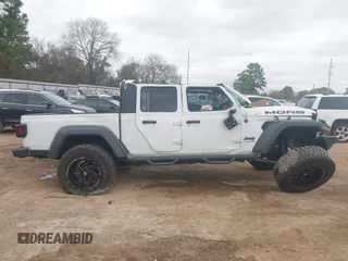 2020 Jeep Gladiator Sport S с VIN 1C6JJTAG1LL204637, выставлен на аукционе IAAI как лот 41743343 с пробегом 94 305 миль миль и . История ставок и продаж доступна на DreamBid. Изображение 14.