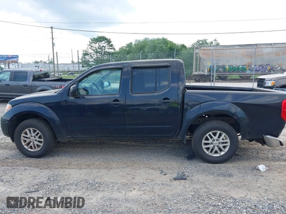 2015 Nissan Frontier S with VIN 1N6AD0EV2FN735908, listed as a IAAI auction lot 42388456 with 164,889 mi miles and . Bid and sale history available at DreamBid. Image 14.