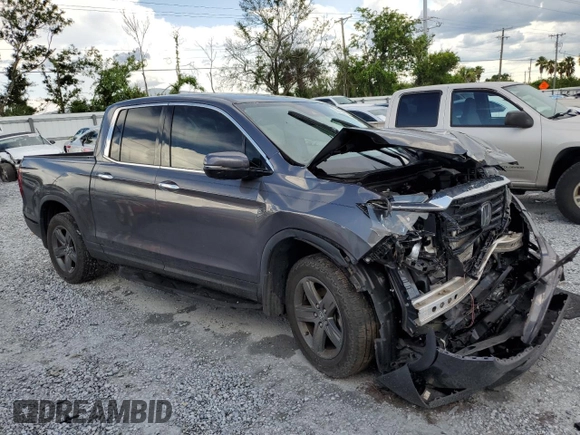 2023 Honda Ridgeline RTL-E with VIN 5FPYK3F79PB010418, listed as a Copart auction lot 62272845 with 39,739 mi miles and Salvage title. Bid and sale history available at DreamBid. Image 4.