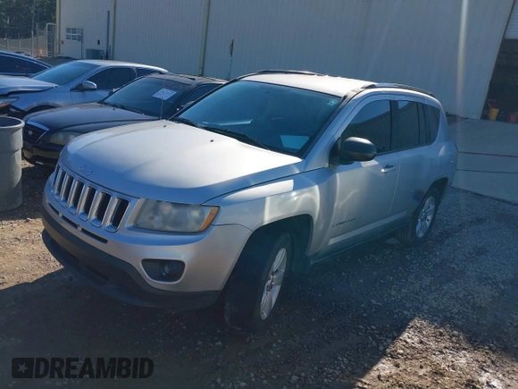 2011 Jeep Compass with VIN 1J4NT1FB8BD248904, listed as a IAAI auction lot 41667133 with 212,887 mi miles. Bid and sale history available at carsss.com. Image 2.