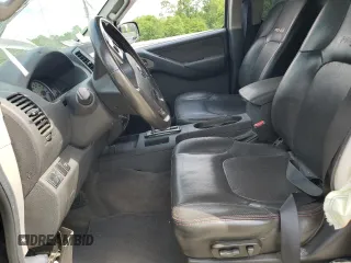 2012 Nissan Frontier Pro-4X z VIN 1N6AD0EV4CC405470, wystawiony jako Copart lot #54186715 z przebiegiem Nie podano mil oraz Szkoda całkowita • Salvage title. Historia ofert i sprzedaży dostępna na DreamBid. Obrazek 7.