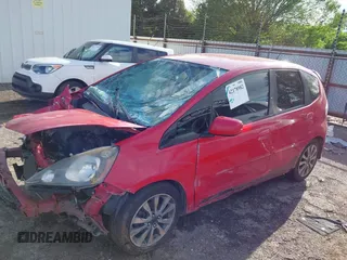 2013 Honda Fit Sport z VIN JHMGE8H51DC080183, wystawiony jako IAAI lot #42178982 z przebiegiem 174 133 mil mil oraz . Historia ofert i sprzedaży dostępna na DreamBid. Obrazek 14.